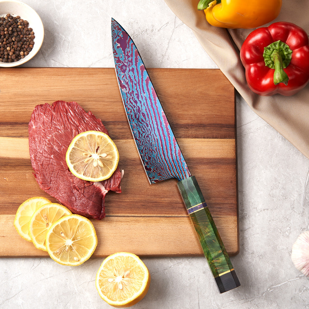 Chef's knife with a decorative handle on a cutting board with meat and lemons.